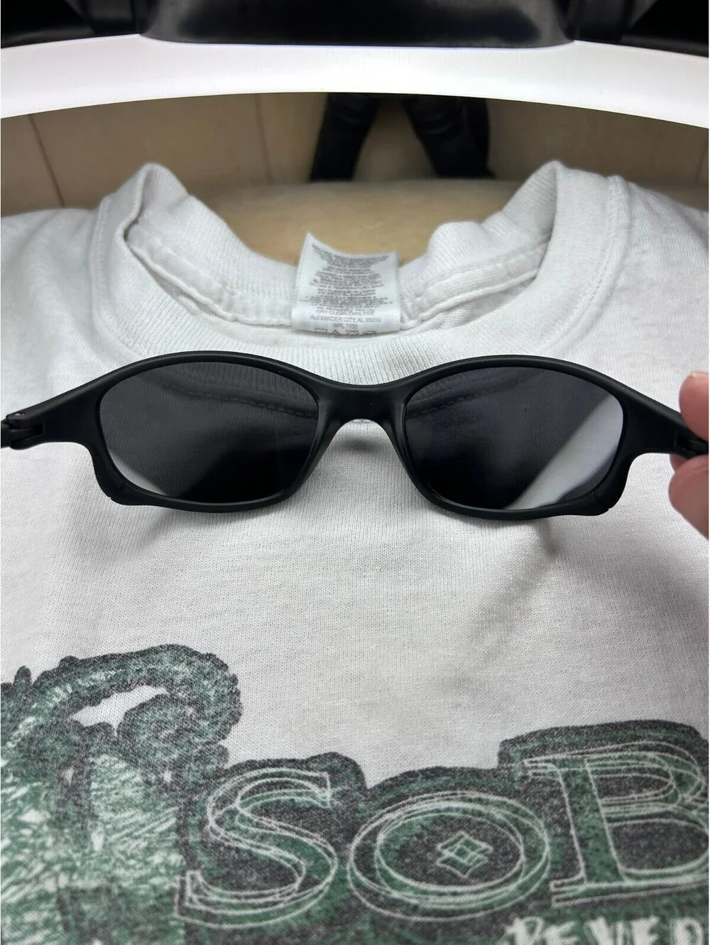 Black oval Sunglasses with Dark Lenses